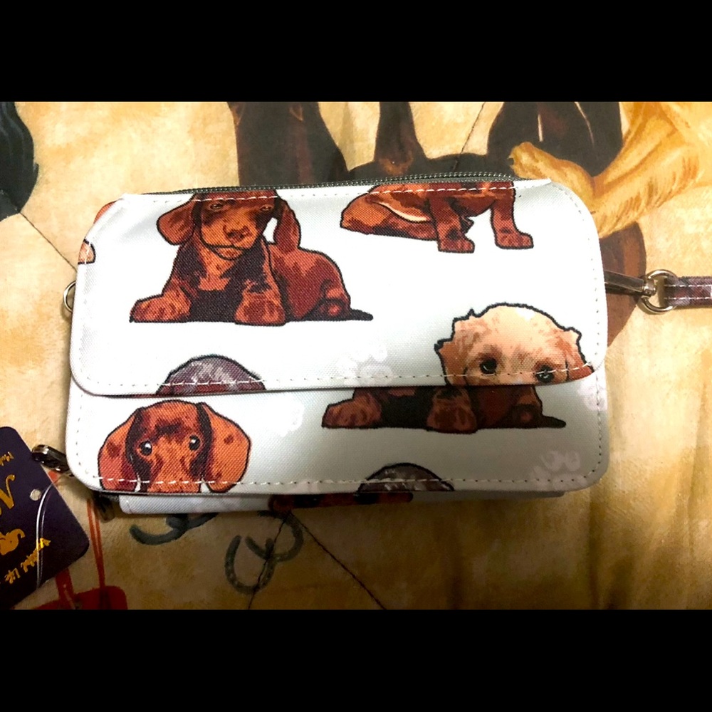 All in one cross body Ngil brand wallet wallet with dogs.
